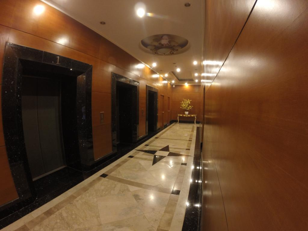 Burgundy Mckinley Place Service Apartment Manila Exterior photo